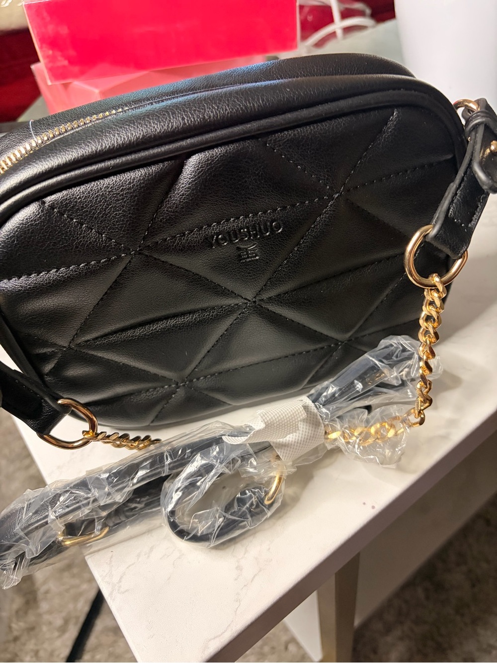 Black Quilted Crossbody Bag with Gold Chain Strap